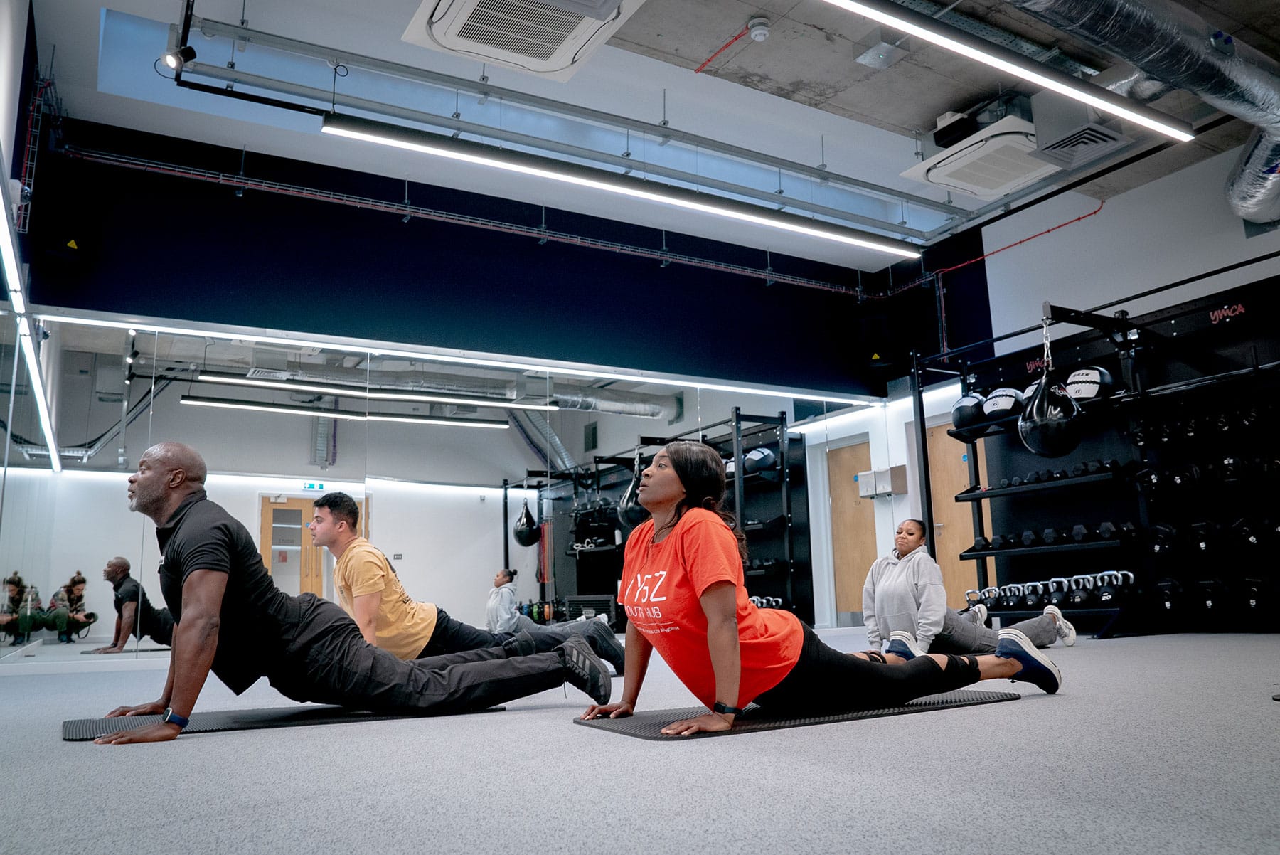 a group class in a yoga pose